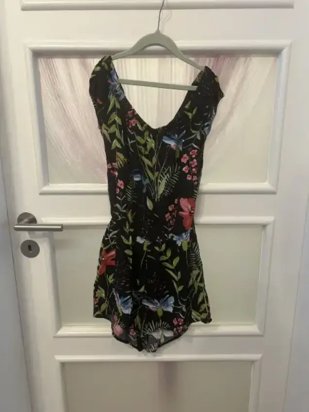 Jumpsuit, schwarz m. Blumen
